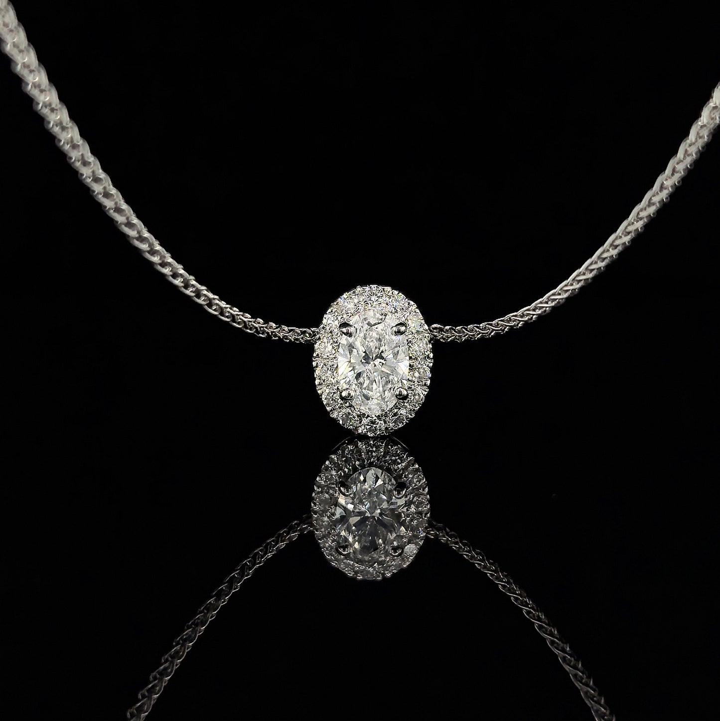 18k W/Gold, 0.29ct Oval Cut Diamond Halo Convertible Ring / Pendant
